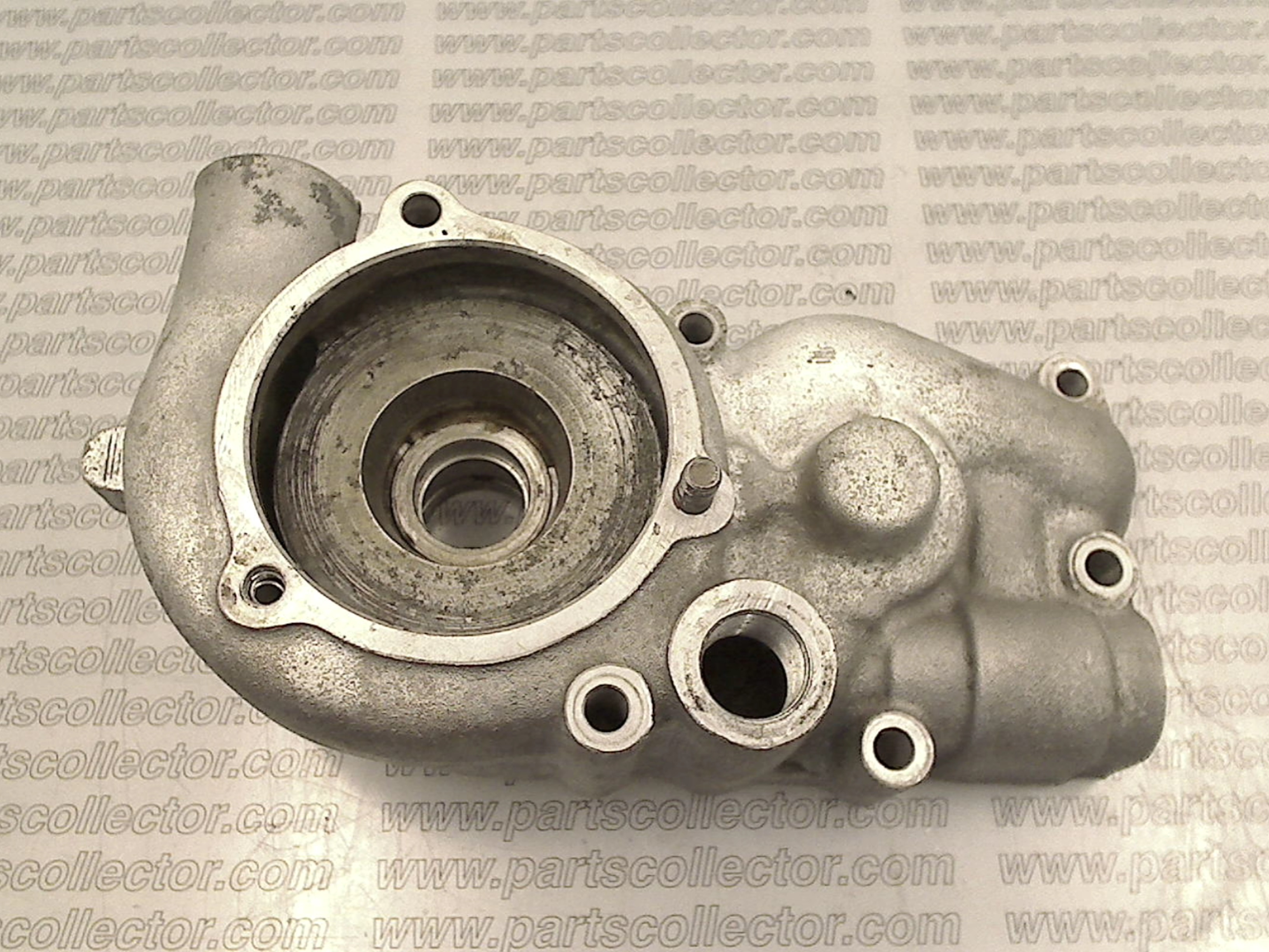 WATER AND OIL PUMP HOUSING